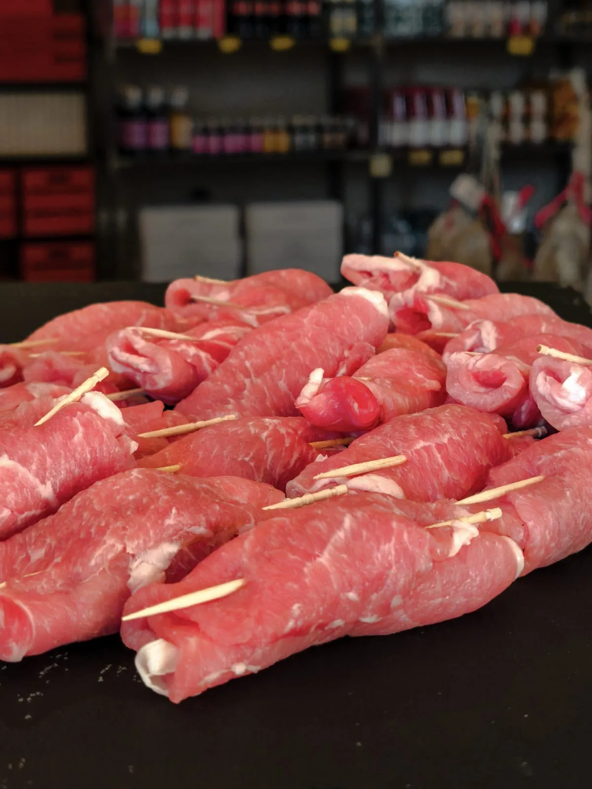 Involtini di lonza di maiale e speck